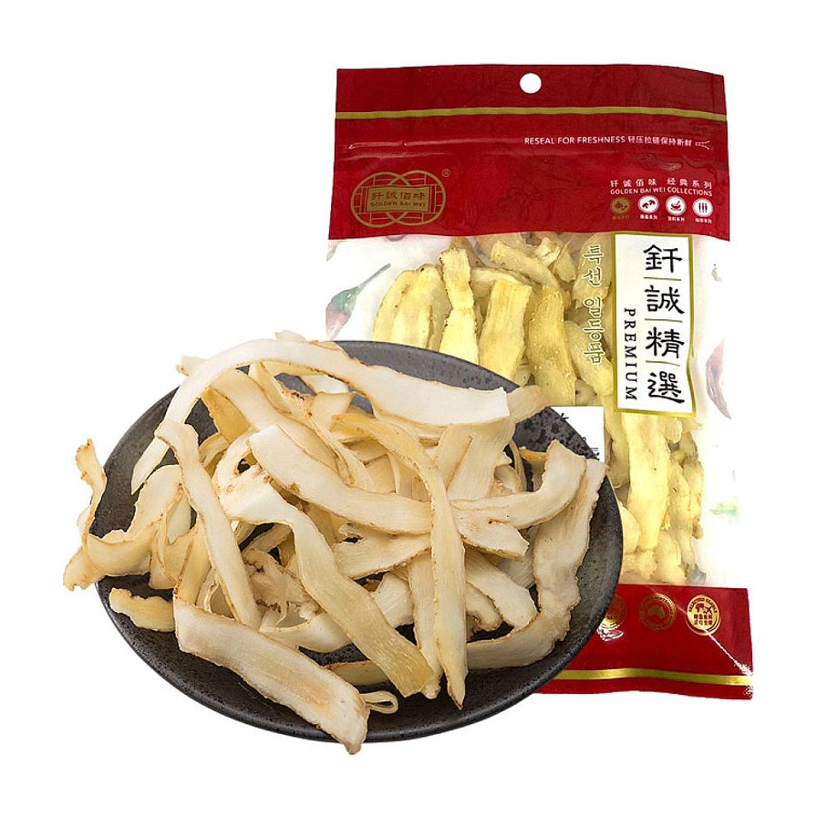 钎诚特级玉竹50g包装袋，背景为红色封口条，前方黑色圆盘盛放着色泽微黄、片厚均匀的干燥玉竹片。