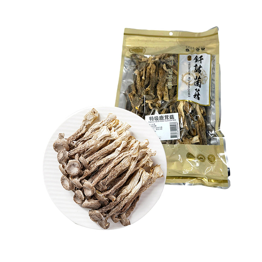 钎诚特级鹿茸菇80g正面包装图，透明袋装可见内部完整的干鹿茸菇，印有特级鹿茸菇及品牌信息。