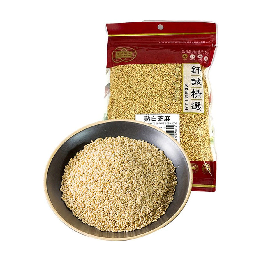 一袋200克装的钎诚熟白芝麻，包装袋呈红色和透明色，前方摆放着一小碗装满的饱满熟白芝麻。