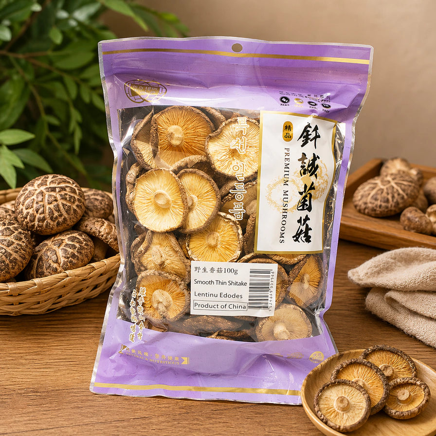 钎诚香信干货包装正面图，紫色封口设计，标签标有野生香信100g及Premium Mushrooms字样。