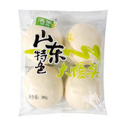 清美山东特色大馒头原味包装图，内含四个饱满的白色大馒头，包装袋上印有清美美食品牌标识及山东特色大馒头字样。