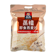 桂格蒸糯即食燕麦片包装正面图，展示品牌Logo、蒸糯即食燕麦片字样以及一勺软糯燕麦粥的特写图。