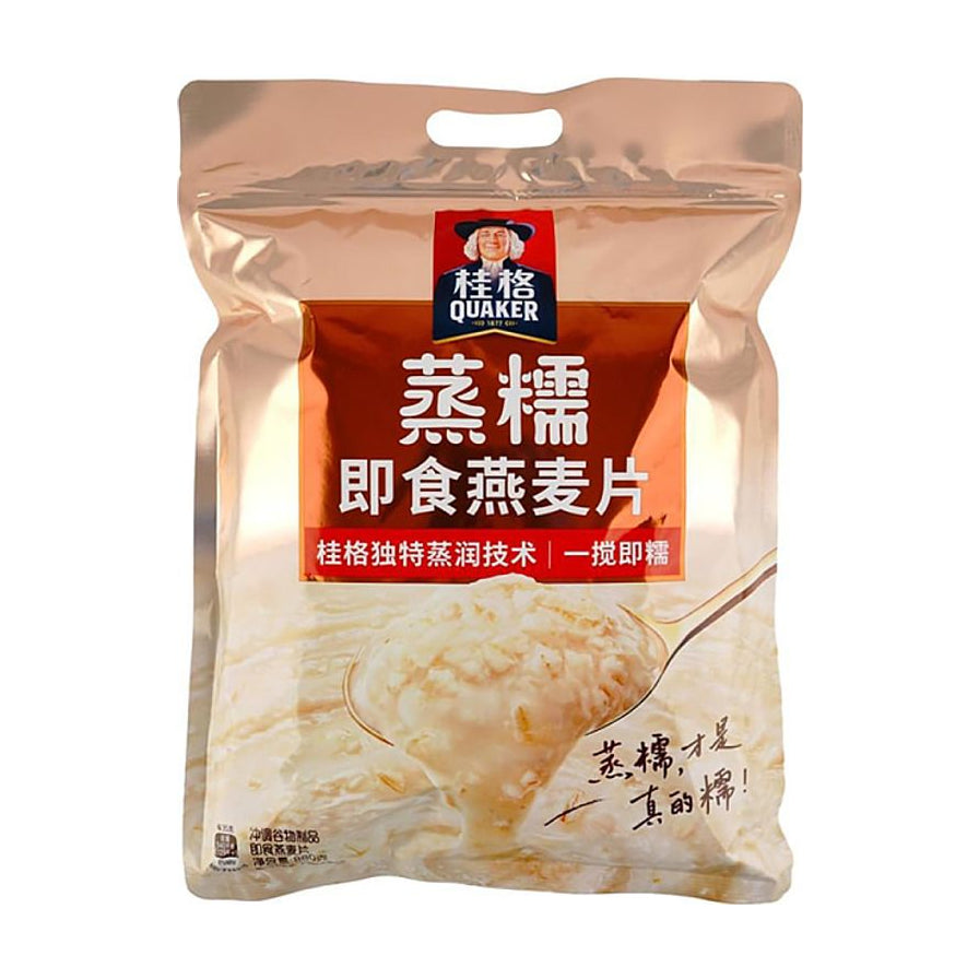 桂格蒸糯即食燕麦片包装正面图，展示品牌Logo、蒸糯即食燕麦片字样以及一勺软糯燕麦粥的特写图。