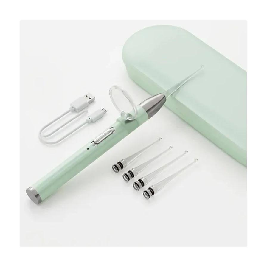薄荷绿充电式可视掏耳勺套装平铺图，包含带放大镜的主机、四个替换勺头、USB 充电线及磁吸收纳盒。