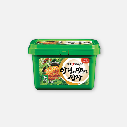 Sempio 韩式包饭酱 500g 玻璃瓶装正面图，红色酱料清晰可见