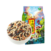 十月稻田七色糙米 1kg 包装袋正面，展示七种谷物混合的杂粮饭产品