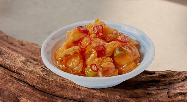 袋装即食麻辣扇贝裙边商品补充图，展示包装外观与净含量