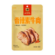 五贤斋香辣素牛肉 108g 自立袋包装正面图，黄色背景印有橙色大字及切片状大豆蛋白制品图案。