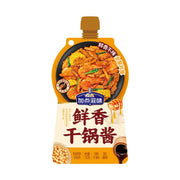 加点滋味鲜香干锅酱210g包装正面图，包装上印有干锅虾、玉米等食材的成品图，标注鲜香不辣、全家共享。