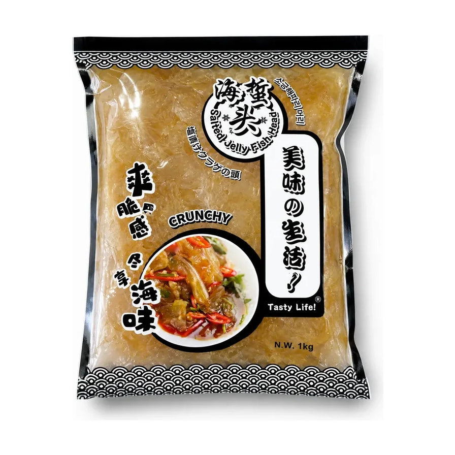 Tasty Life 爽脆渤海海蜇头 1kg 包装正面图，透明袋装可见内部晶莹剔透的海蜇头，包装印有海蜇头、爽脆感、冬享海味等字样及凉拌海蜇头成品示意图。