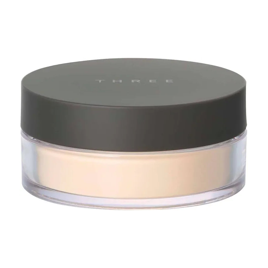 Three 凝光蜜粉 01 号产品正面图，展示深灰色盖子和透明瓶身内的米色散粉。