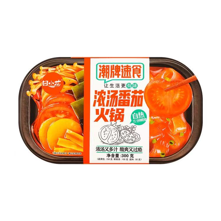 田小花自热火锅浓汤番茄味包装正面，展示红色番茄汤底与丰富蔬菜食材。