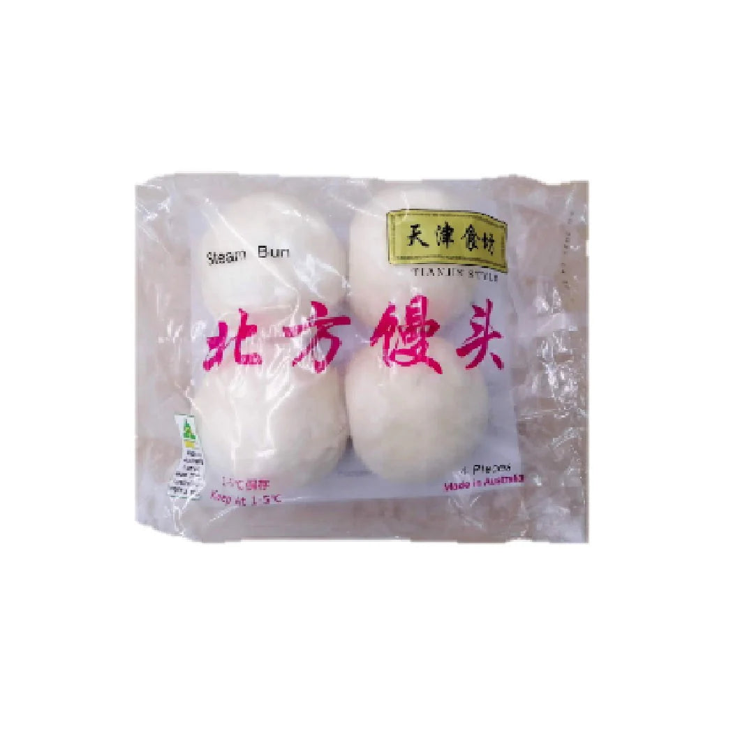 四个白白胖胖的北方馒头整齐排列，展示松软扎实的老面质感