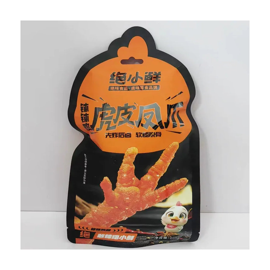 绝小鲜虎皮凤爪钵钵鸡味独立包装袋正面，黑色与橙色设计，印有凤爪实物图和卡通小鸡。