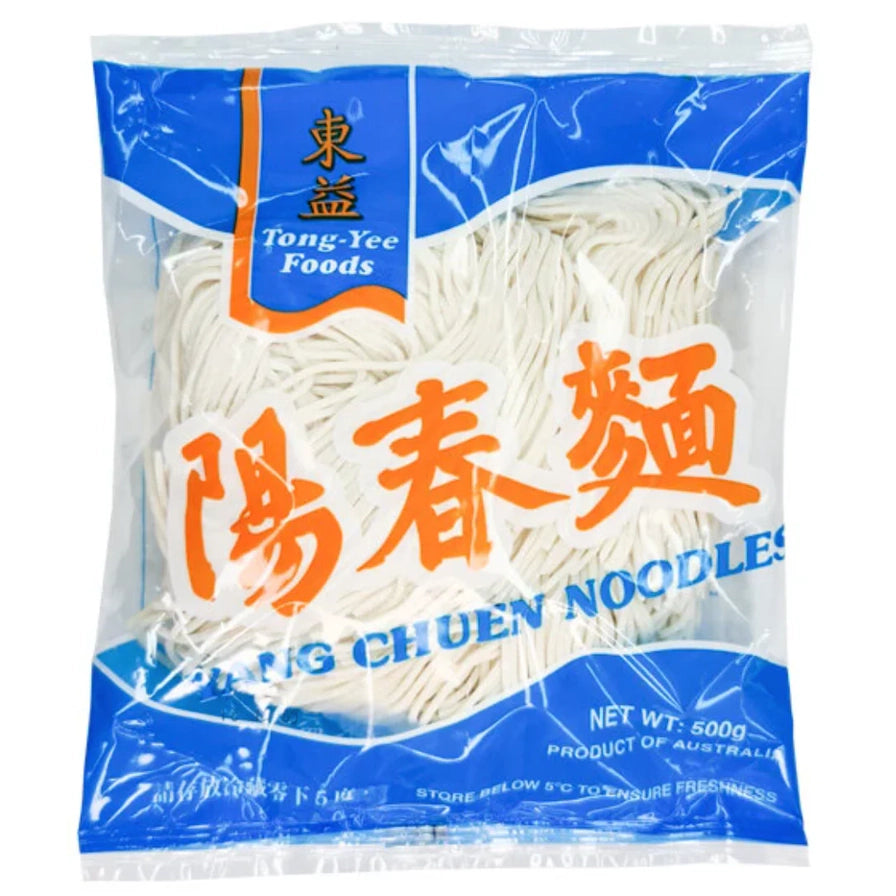东益阳春面透明包装袋正面，清晰可见内部干燥面条，印有蓝色品牌标识和橙色阳春面字样。