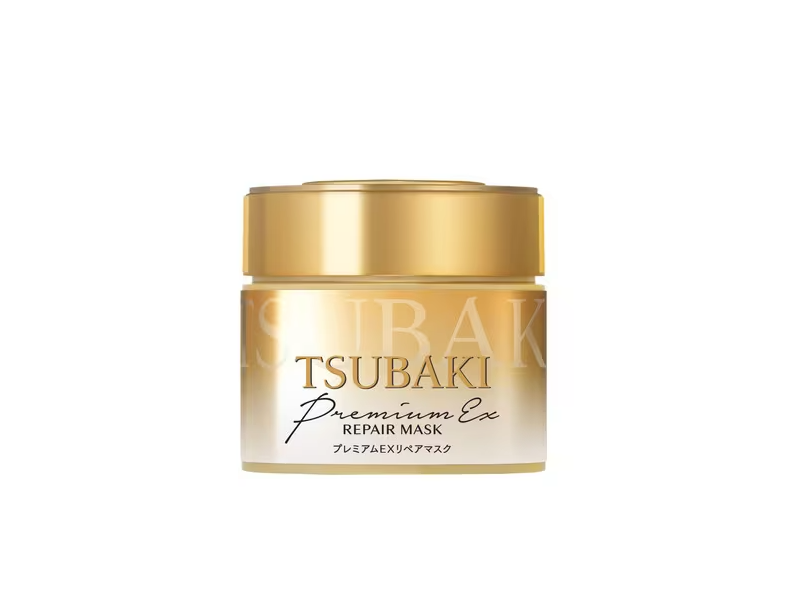 Tsubaki Premium Ex 金色修护发膜罐装正面图，金色瓶身设计