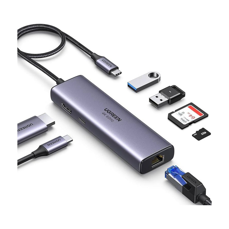 绿联7合1扩展坞，深灰色金属外壳，展示连接HDMI、USB - C、USB - A、SD卡、TF卡及千兆网线的全接口使用场景。