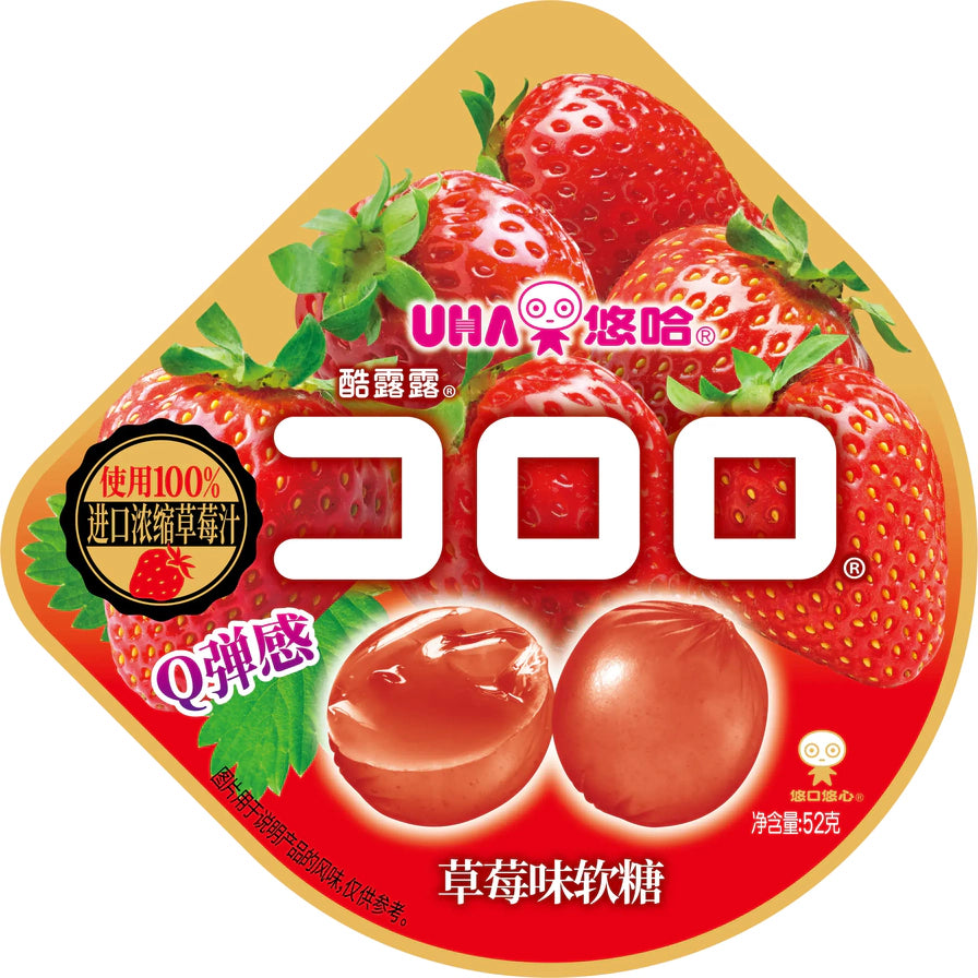 悠哈UHA酷露露草莓味软糖包装，红色包装袋上印有鲜红草莓和切开的软糖展示图。