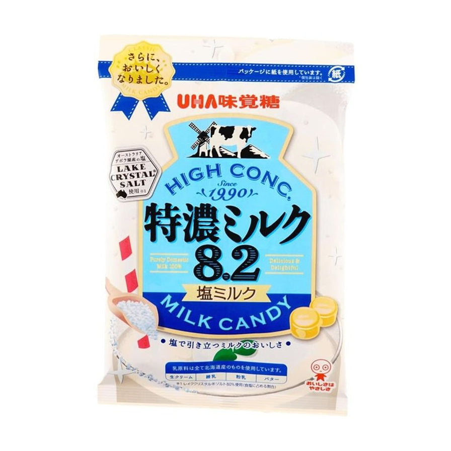 UHA味觉糖特浓牛奶糖8.2系列海盐味包装正面图，包装上有奶牛图案、盐勺和两颗黄色奶糖。