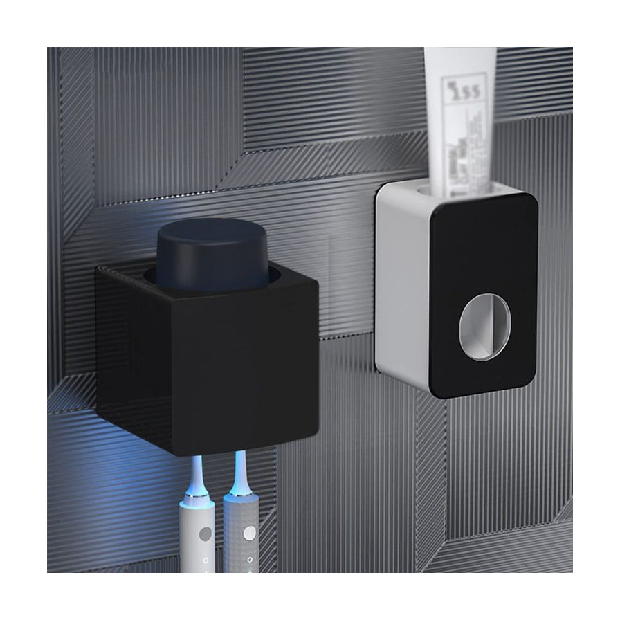 安装在灰色纹理墙面上的智能牙刷消毒器和自动挤牙膏器，展示壁挂免打孔安装效果。