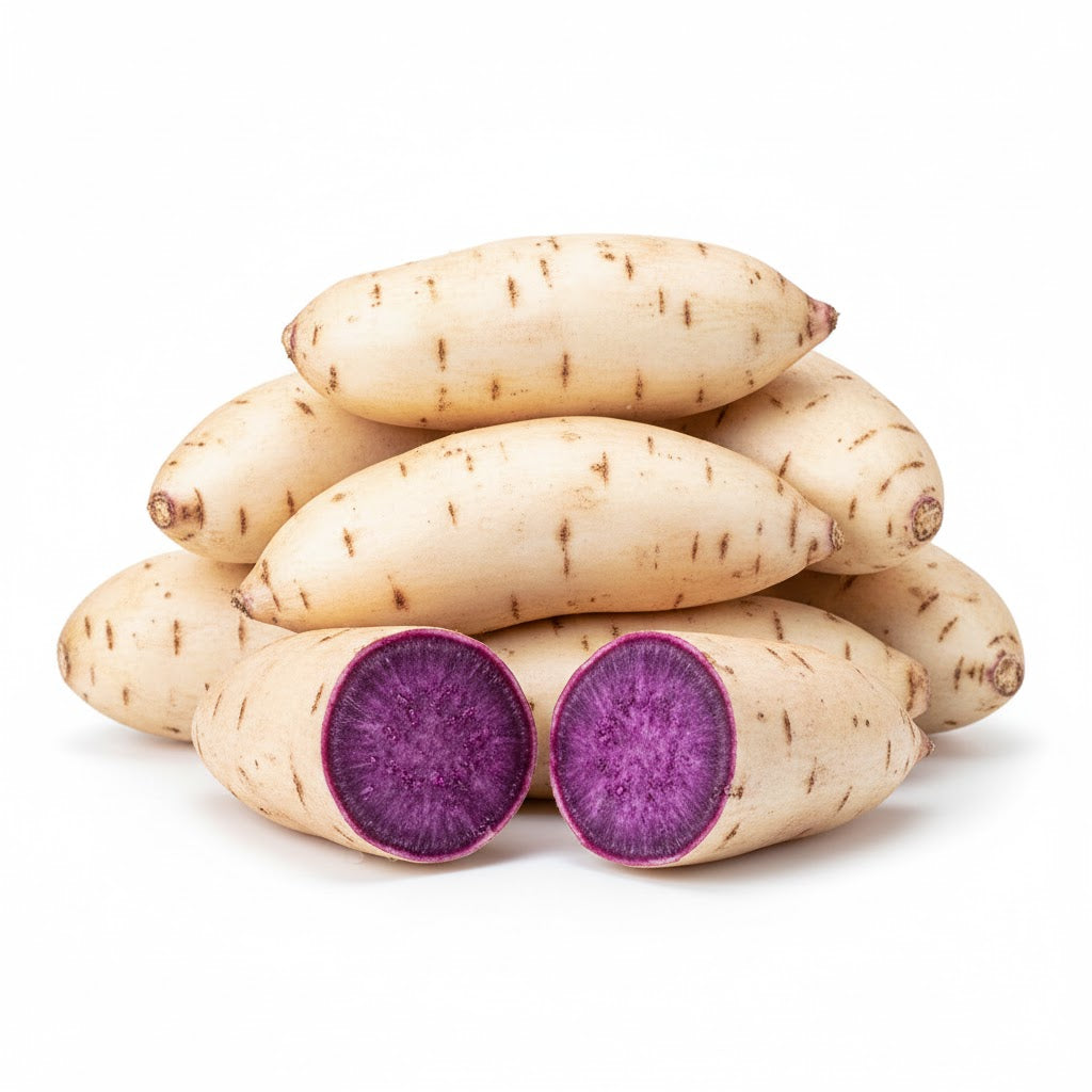 1kg 白皮紫薯特写，表皮洁白，切开后露出粉糯湿润的紫色果肉