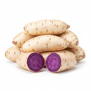 1kg 白皮紫薯特写，表皮洁白，切开后露出粉糯湿润的紫色果肉
