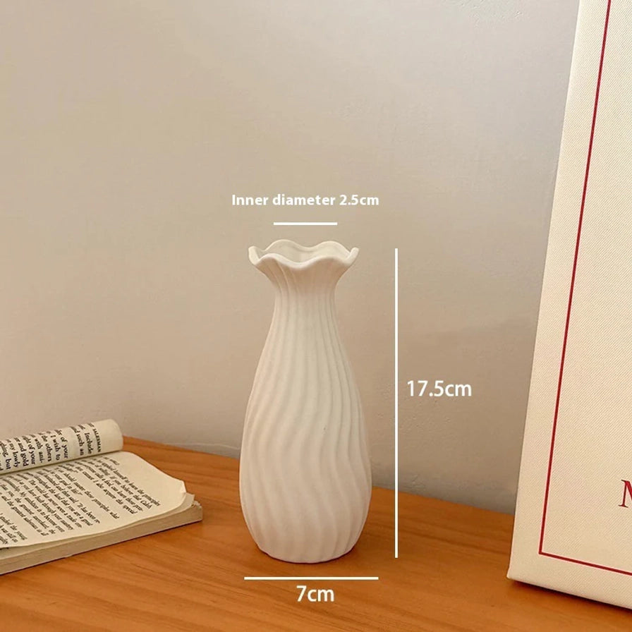 白色波浪口花瓶尺寸标注图，显示高度17.5cm，底部直径7cm，内径2.5cm。