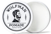 Wolfman 男士发油白色圆罐包装正面展示，盖面印有品牌 Logo 及胡须男士插画，旁边展示打开后的白色膏体。