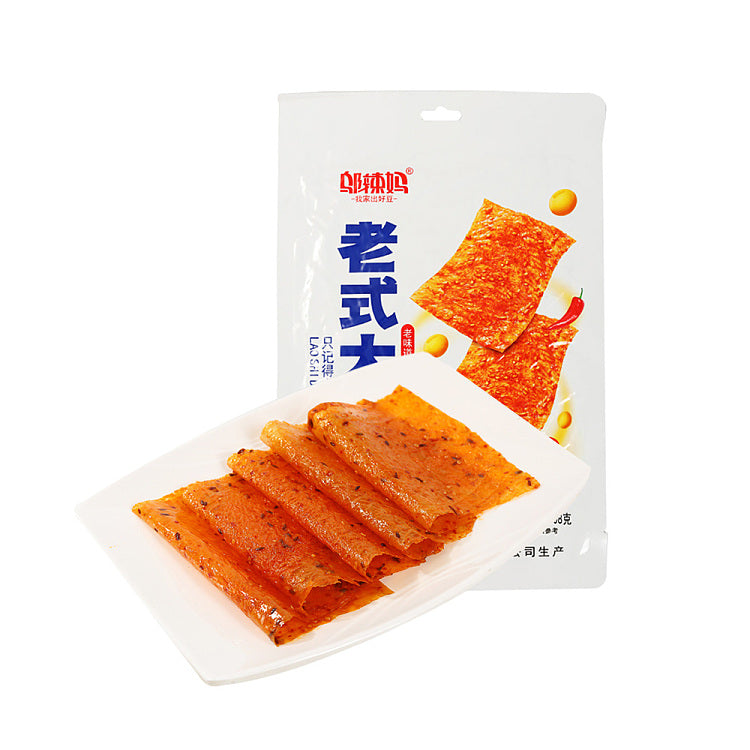 邬辣妈老式大辣片 108g 包装正面，甜辣味大豆蛋白怀旧零食