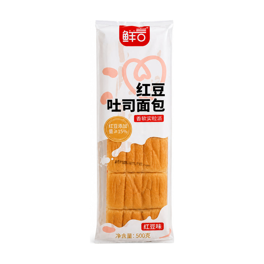 鲜言红豆吐司面包500g袋装，白色背景，包装上印有红豆吐司面包字样，可见内部切片吐司。
