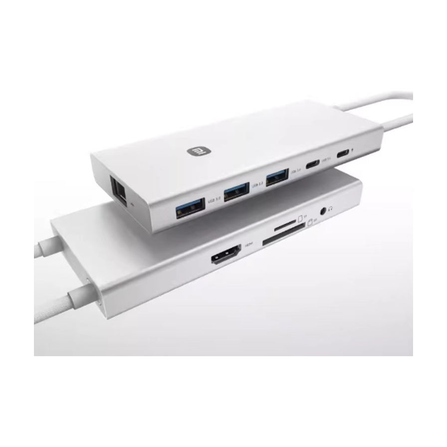 两台小米扩展坞叠放展示，清晰可见HDMI、SD卡槽、TF卡槽及音频接口等侧面细节。