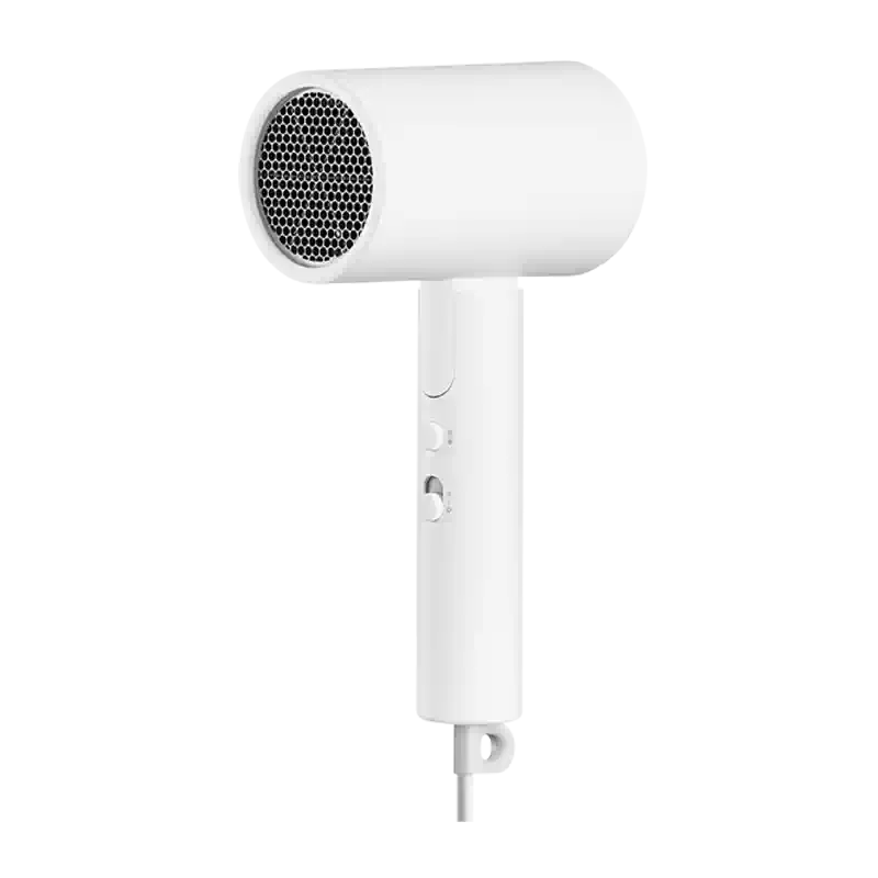 小米 H101 白色便携式电吹风正面特写，黑色背景突出开关按钮与蜂窝网罩。