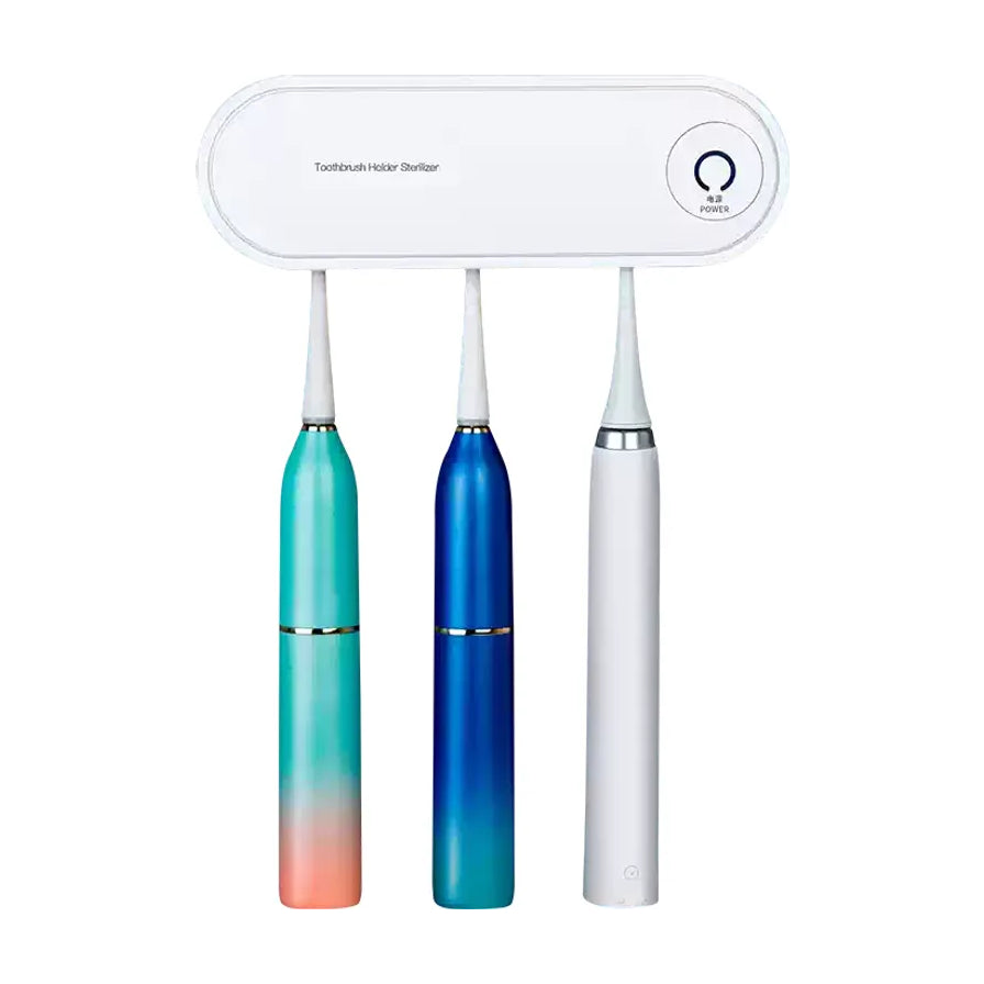 白色小米电动牙刷架正面图，挂有三支不同颜色的电动牙刷，展示三刷位收纳设计。