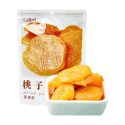 囍桂子桃子干包装袋与一小碗金黄色的厚实桃肉果干。
