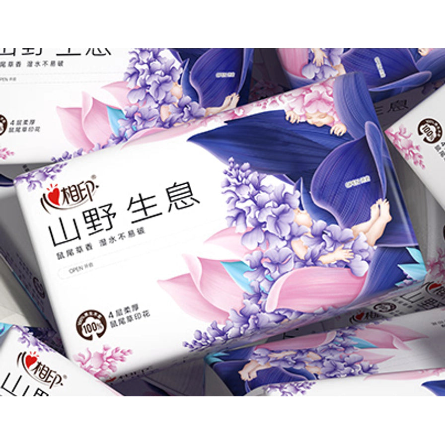 多包心相印山野生息鼠尾草抽纸堆叠展示，包装设计精美，印有紫色鼠尾草花卉图案，突出4层加厚和湿水不易破的产品特性。