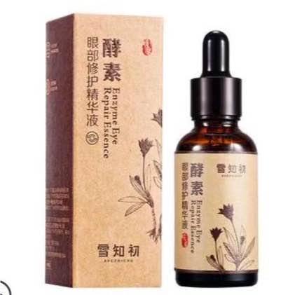 雪知初酵素眼部修护精华液瓶身正面特写，展示滴管设计与产品包装细节