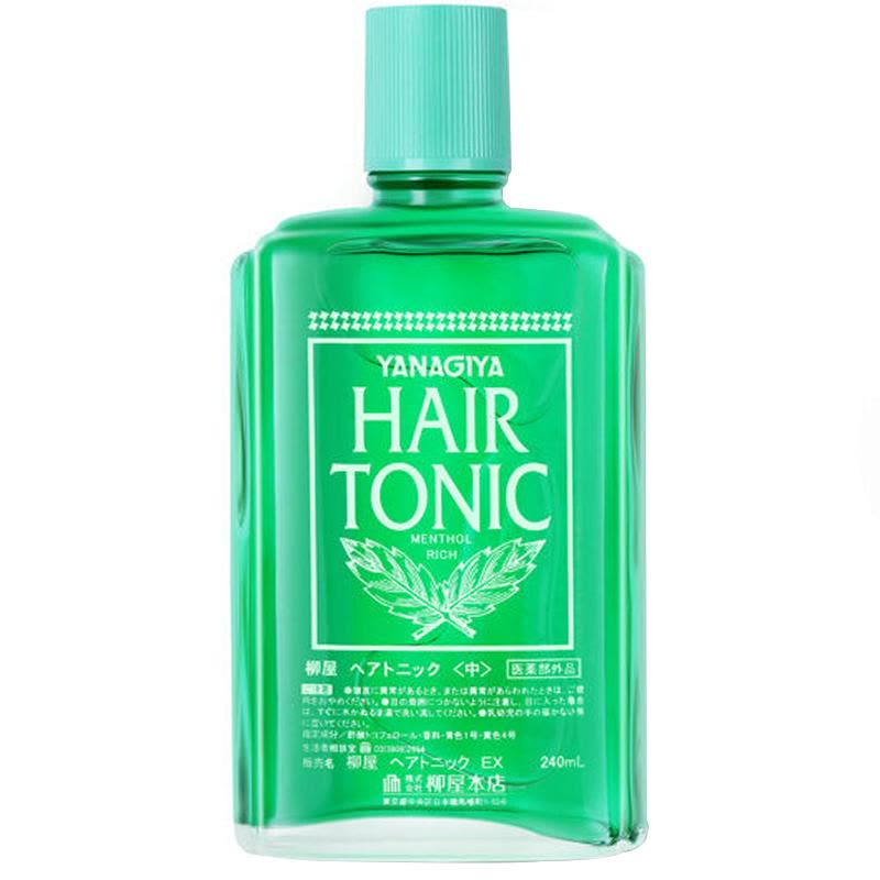 YANAGIYA 柳屋绿色玻璃瓶装发根营养液正面图，瓶身印有英文 HAIR TONIC 及薄荷叶图案。