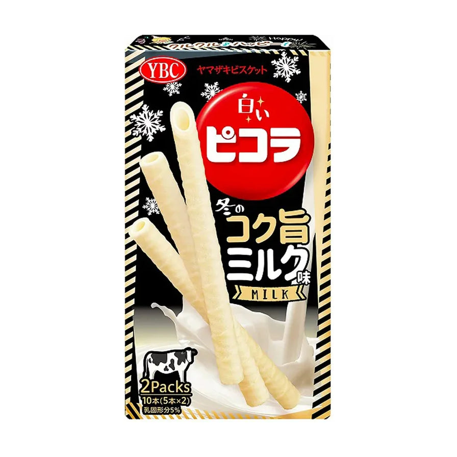 YBC牛奶味蛋卷包装正面图，展示了三根酥脆的白色蛋卷和牛奶飞溅的图案，包装上有红色圆形Logo和日文标识。