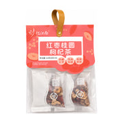 忆江南红枣桂圆枸杞茶外包装，红色封口设计配有提手，透明包装内含独立小袋，可见红枣、桂圆和枸杞干原料。