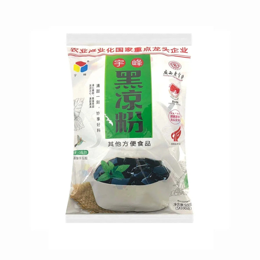 宇峰黑凉粉500g袋装，包装正面印有绿色标签和黑凉粉字样，下方展示了一碗切成块状并点缀薄荷叶的黑色凉粉成品。