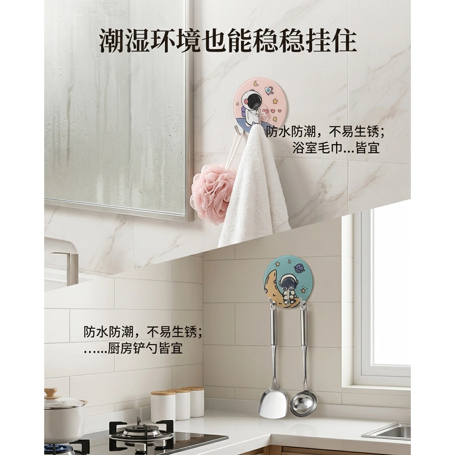 浴室和厨房场景展示图，宇航员粘钩分别挂着浴球毛巾和厨具，配有中文说明文字强调防水防潮功能。