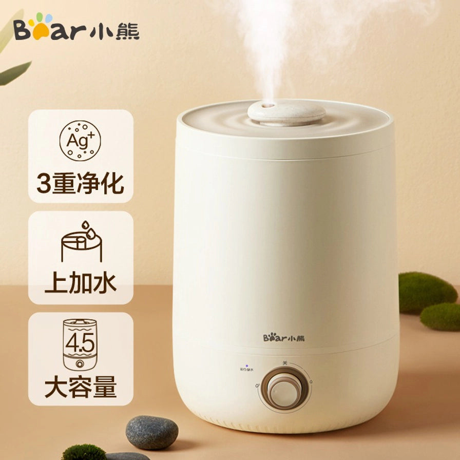 小熊加湿器正在喷雾的状态，左侧图标展示3重净化、上加水和4.5L大容量特点。