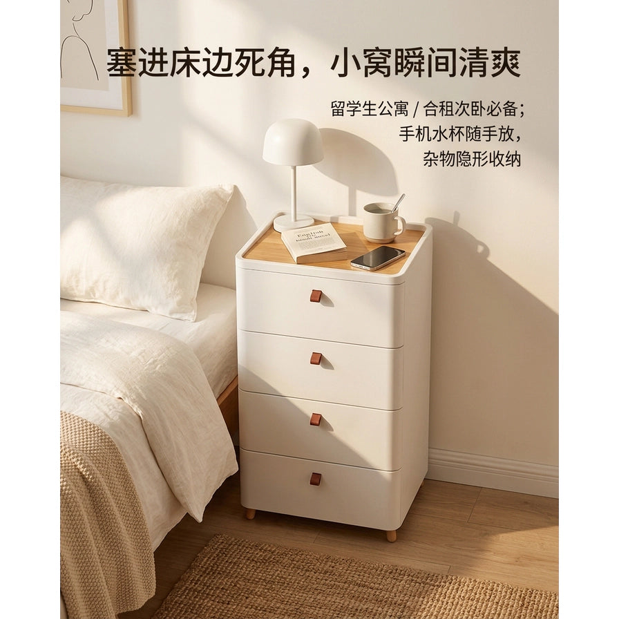 卧室场景中，白色四层床头柜置于床边，顶部放有台灯、书本和水杯，图片上方有中文宣传文案。