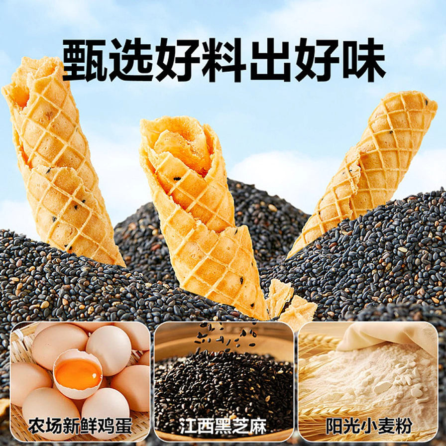 产品原料展示图，包含新鲜鸡蛋、江西黑芝麻和阳光小麦粉，上方有“甄选好料出好味”字样，背景为蓝天白云下的蛋卷。