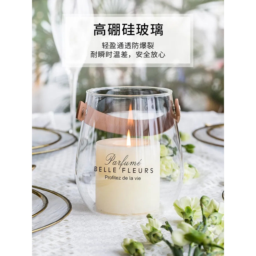 高硼硅玻璃花瓶作为香薰蜡烛杯使用，展示其耐热防爆裂特性，背景为温馨的餐桌布置。
