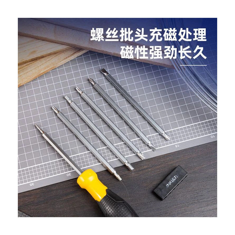 在工作台面上展示的得力螺丝批头，文字说明批头经过充磁处理，具有强劲磁性。