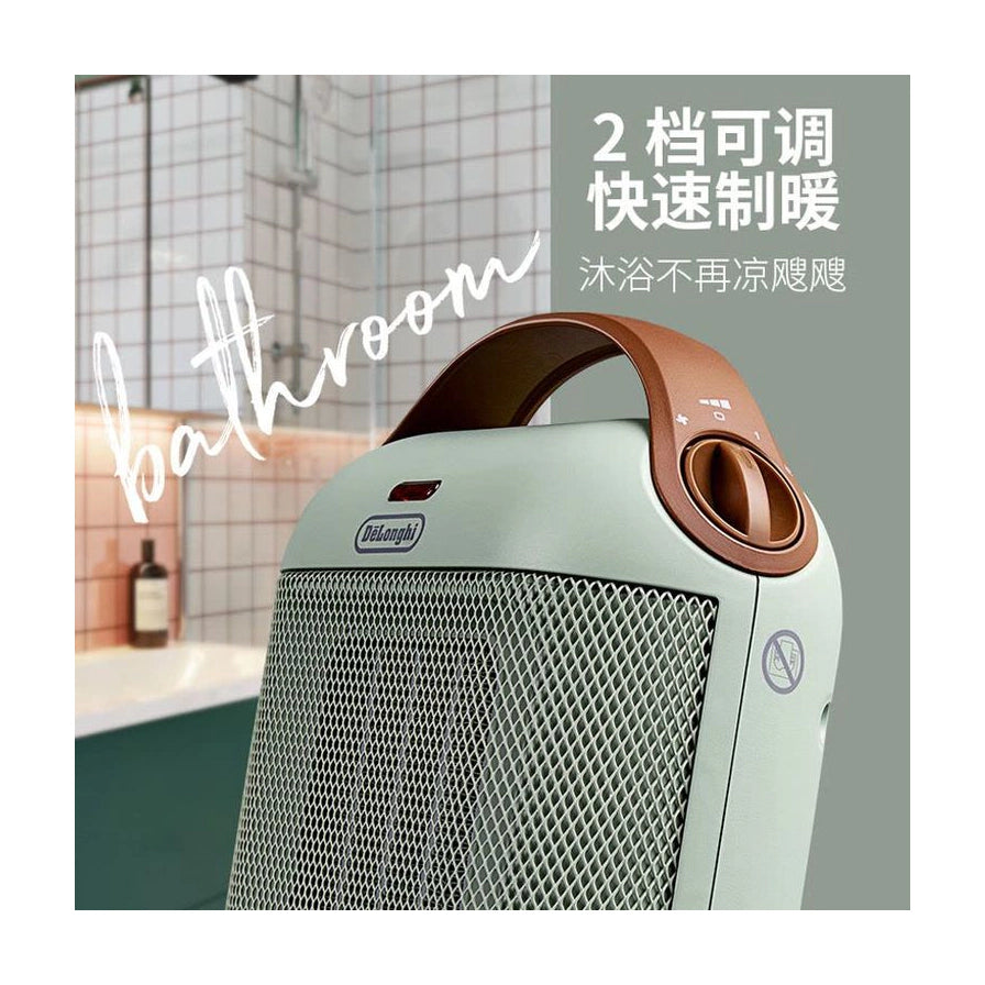 淡绿色德龙暖风机在浴室场景中的近景，侧面展示控制旋钮，背景有“2档可调快速制暖”文字。