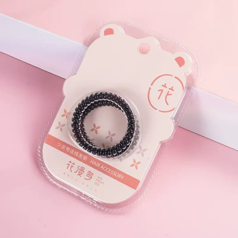 花漫多品牌粉色小熊卡纸包装的黑色电话线发圈，带有中文产品说明。