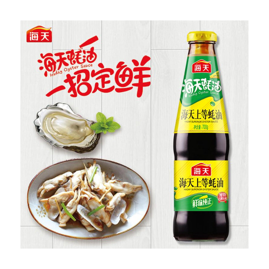 海天上等蚝油产品图，左侧配有生蚝和烹饪好的海鲜菜肴，上方带有“一招定鲜”红色艺术字。