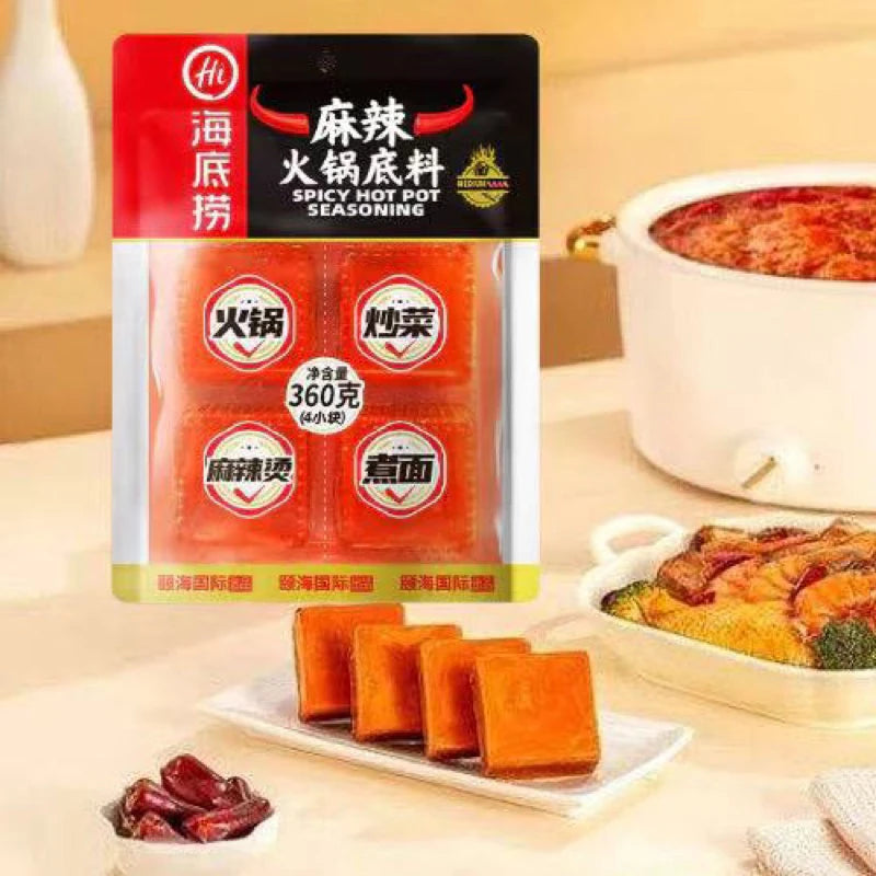海底捞麻辣火锅底料独立包装展示，背景含中文促销文字